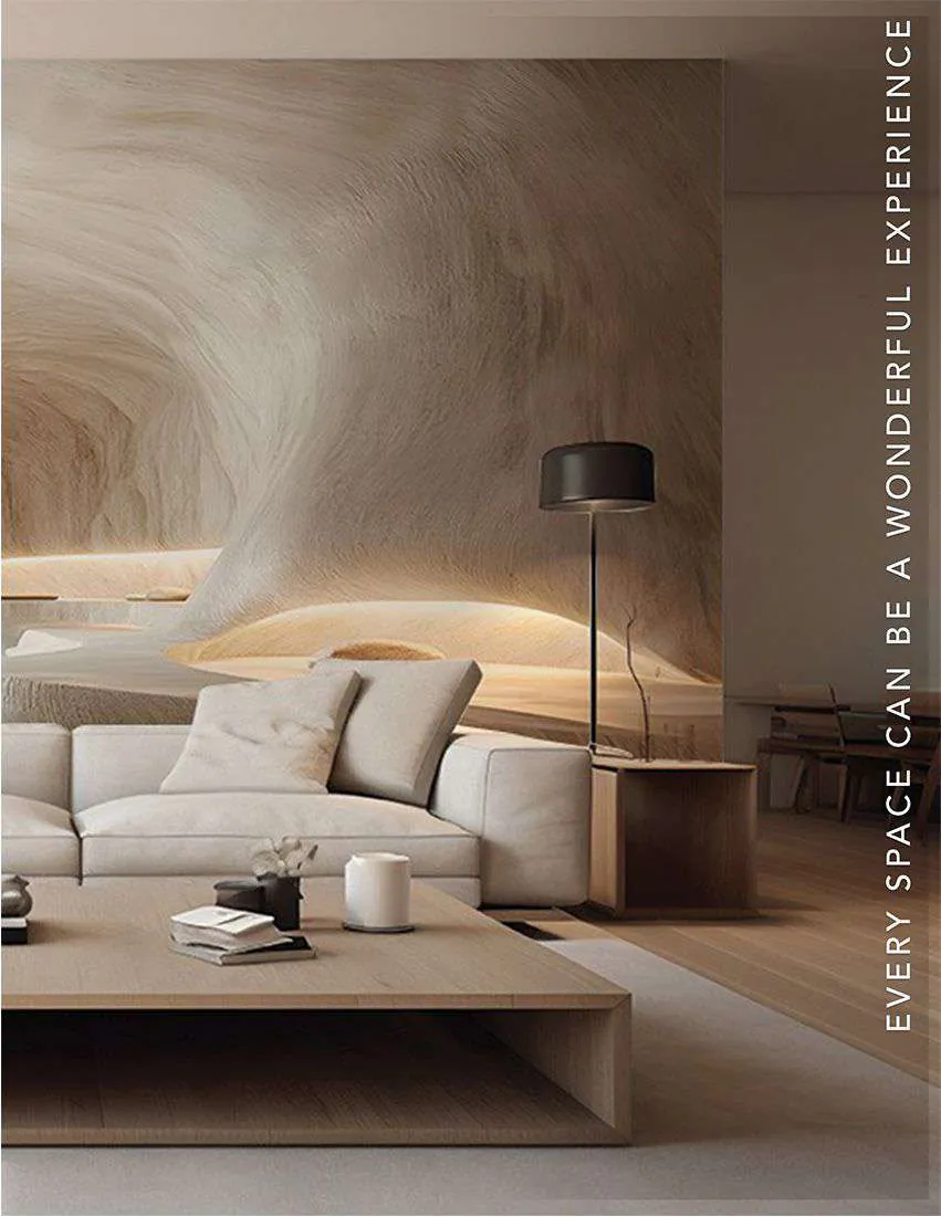 Living room, continued: the sculpted wall wraps past a floor lamp and a low wooden coffee table