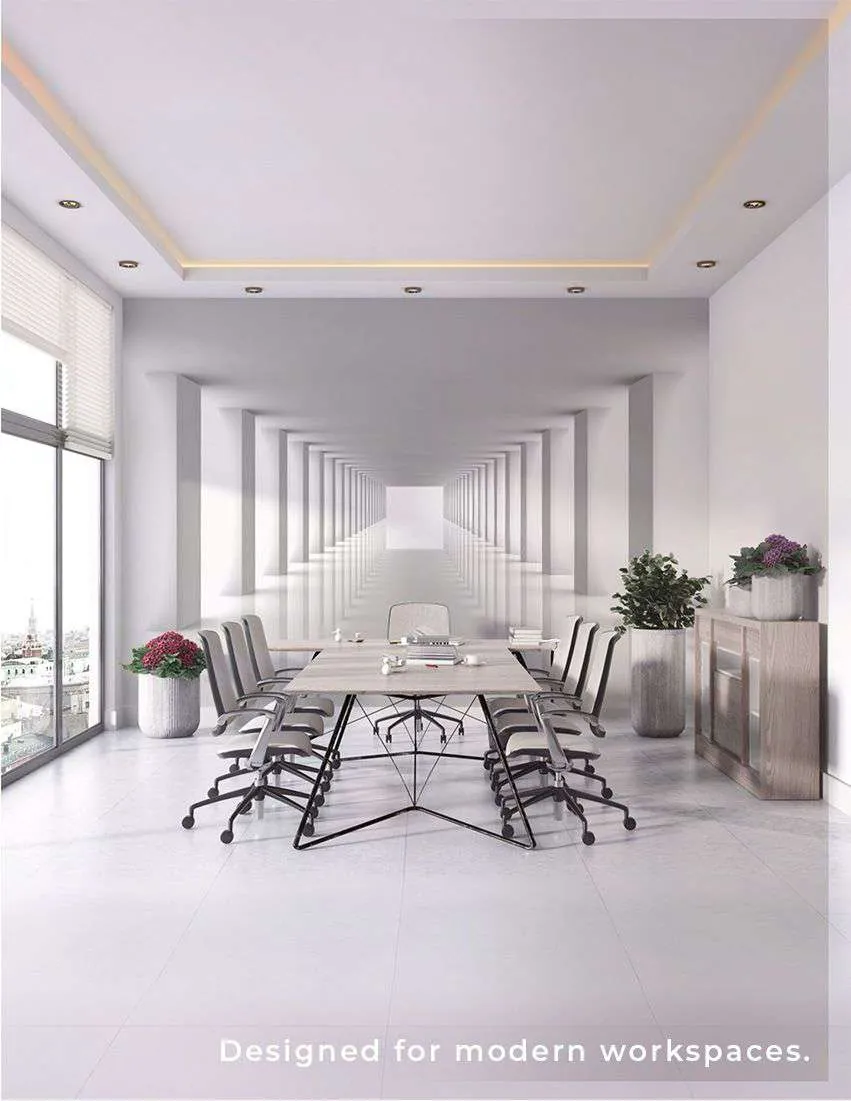 Conference room with a long table and a wall mural that stretches the room into the distance