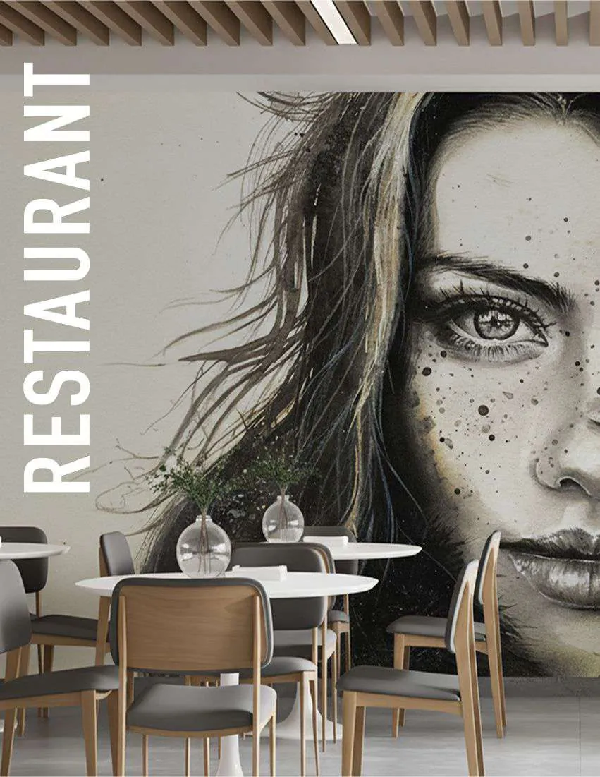 Restaurant wall with a black and white portrait of a woman across the dining room