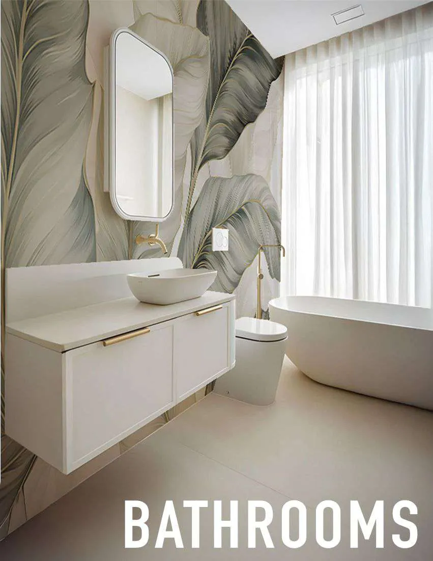 Bathroom with a soft leaf mural behind a floating vanity and a freestanding tub