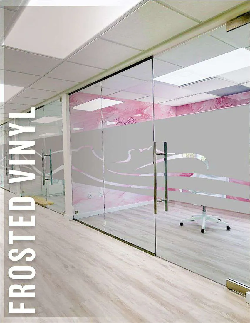Frosted vinyl wave pattern on the glass walls of an office